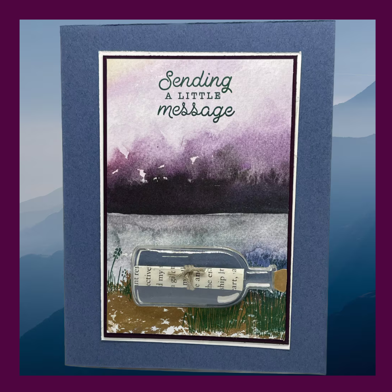 Sending a little message in card that has a 3D message in a bottle. Mountain and lake background