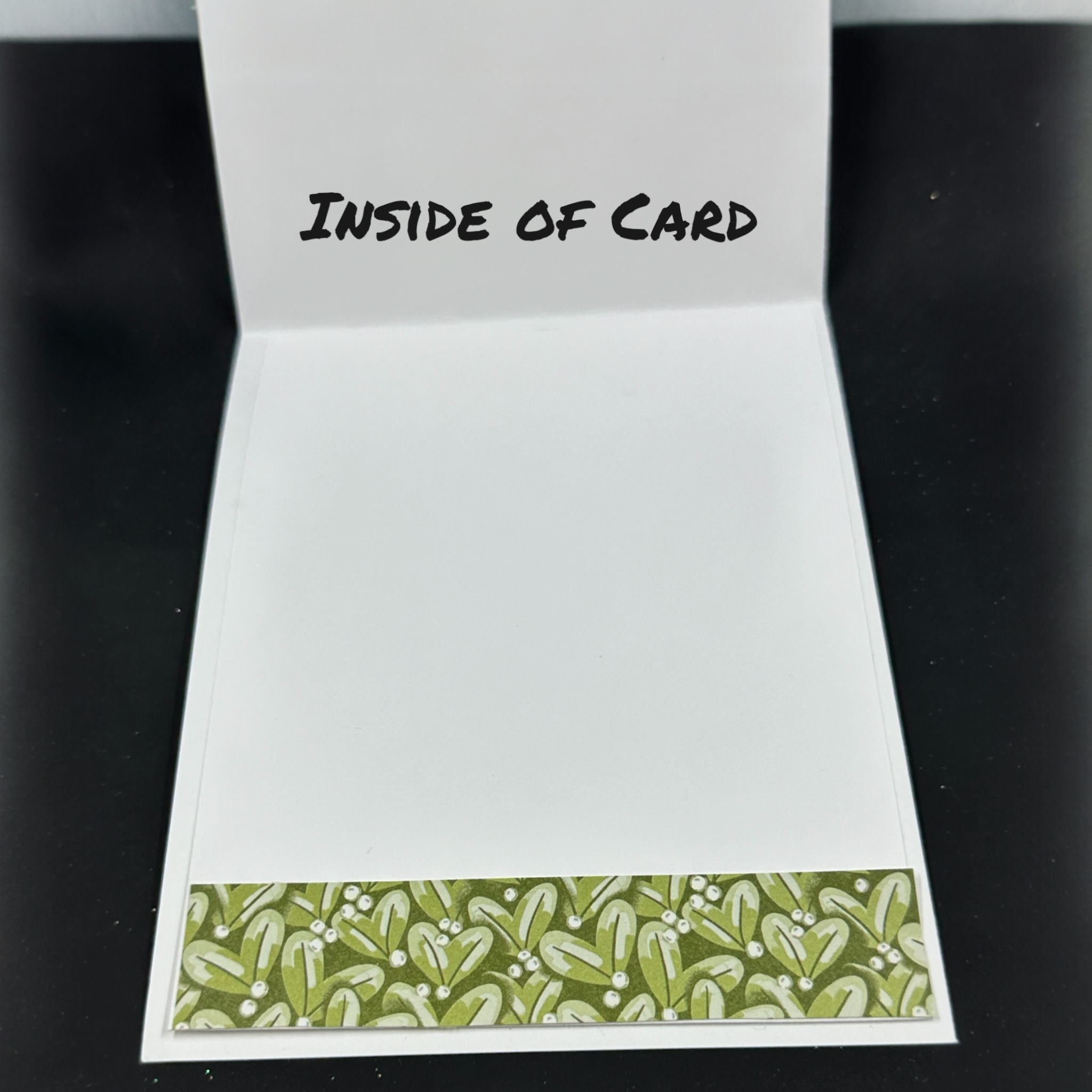 Elegant Christmas Card with Botanical Design and Leaf Embossed Accents