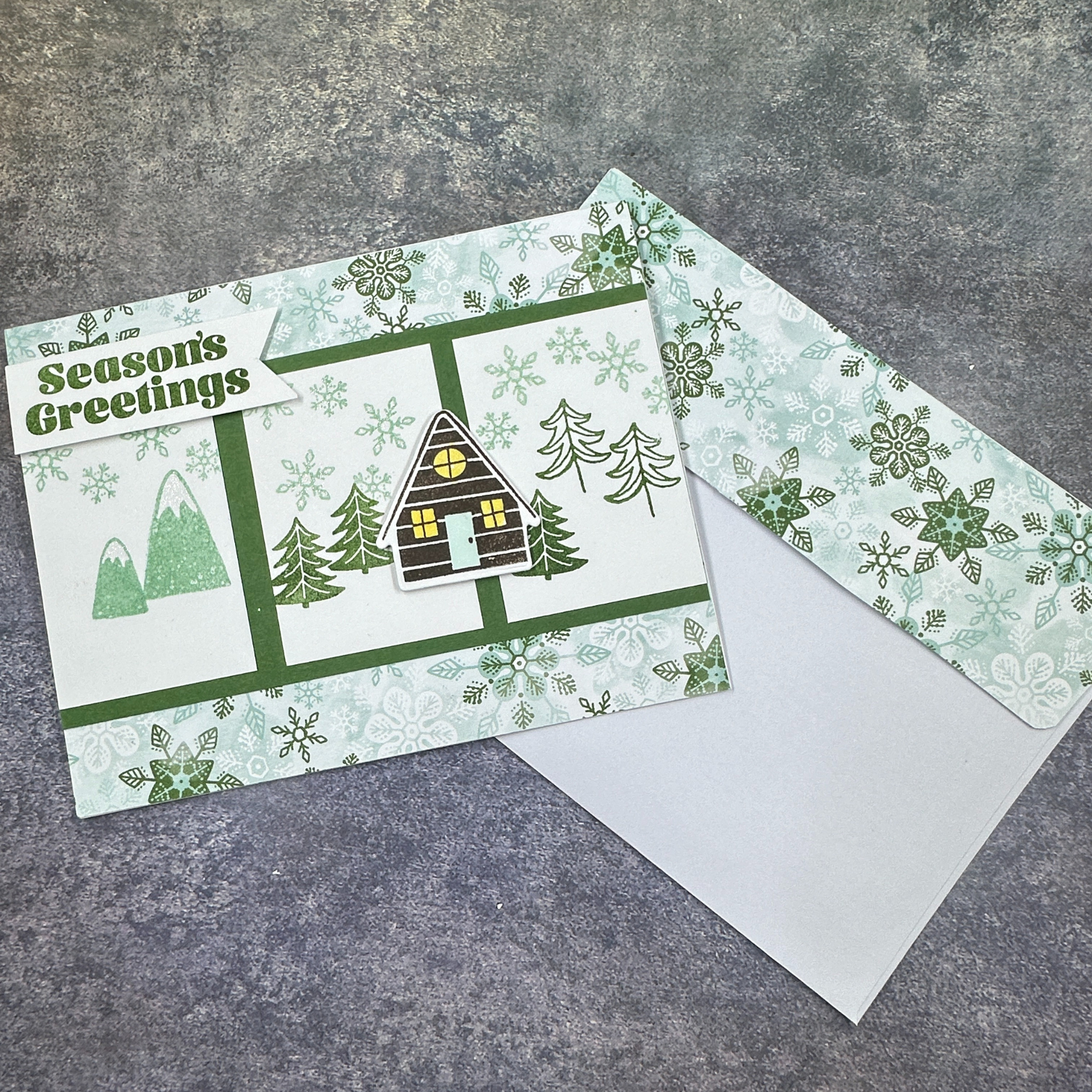 Charming Snowflake Holiday Card with Winter Scene and Warm Home Greeting